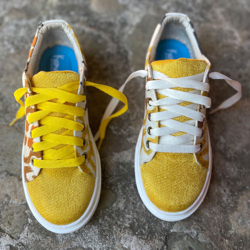 Yellow arabesque tennis shoes